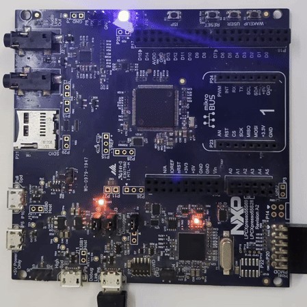 NXP LPC55S69-EVK board with LED blinking from AI-generated firmware